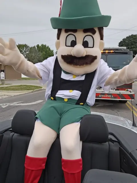 Brattie rides in a float during the parade.